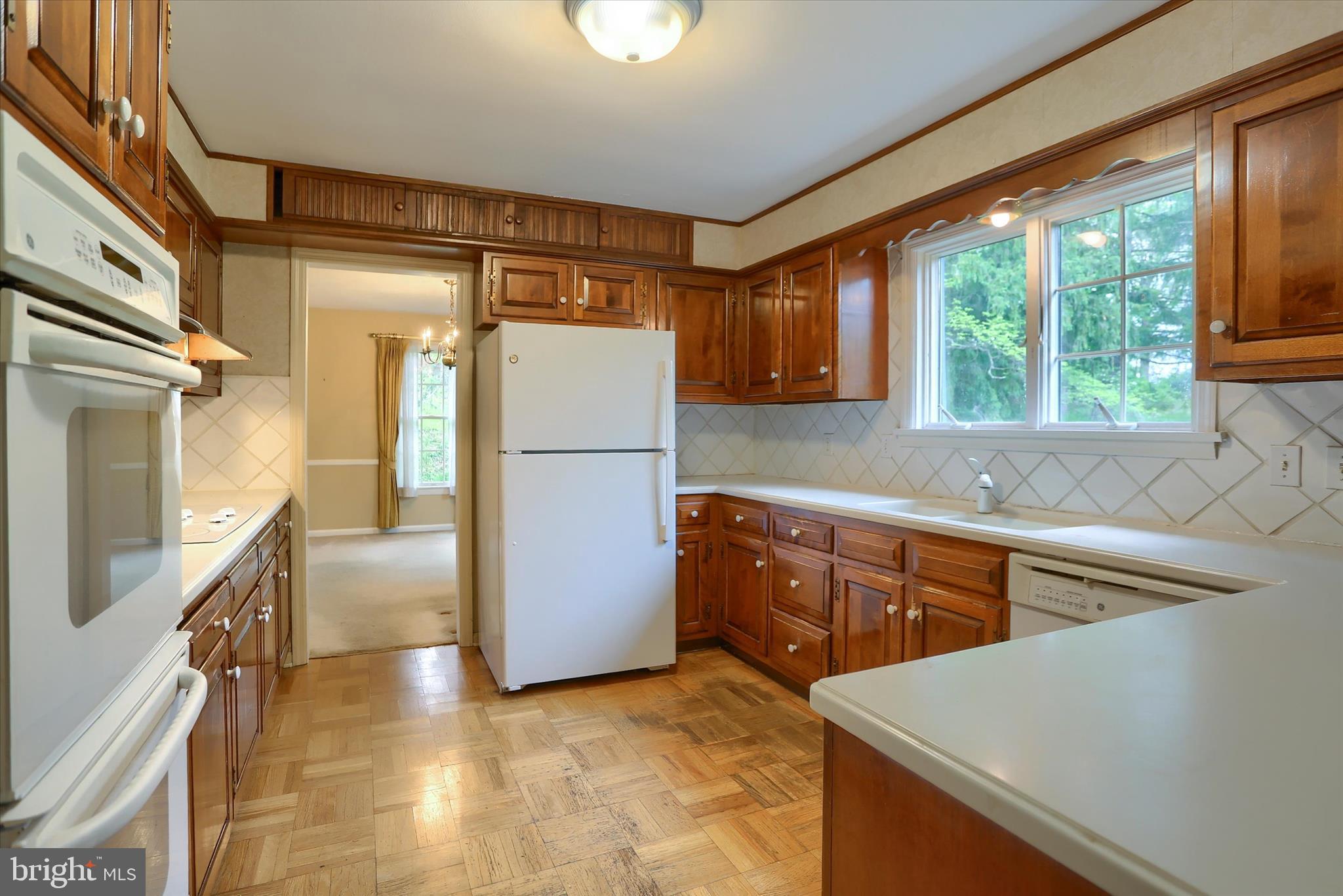 2919 Arcona Road Mechanicsburg, PA 17055 - Photo 13 of 49 a kitchen with cabinets a refrigerator and a sink