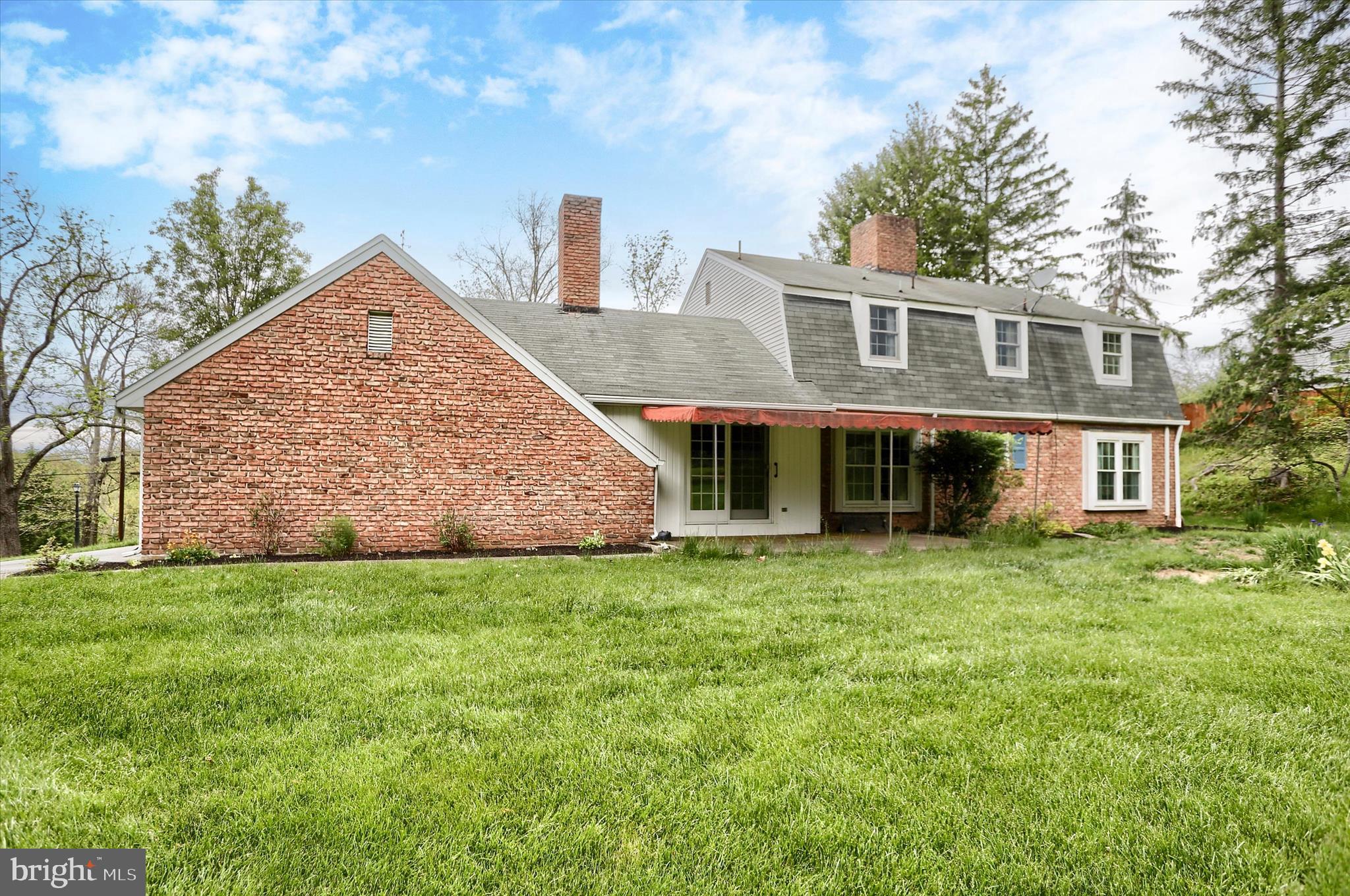 2919 Arcona Road Mechanicsburg, PA 17055 - Photo 34 of 49 a front view of a house with a garden