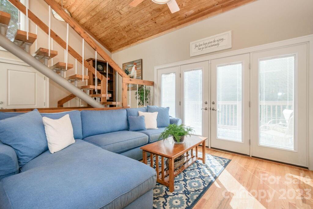 154 Rugby Drive Hendersonville, NC 28791 - Photo 21 of 48 a living room with furniture and a window
