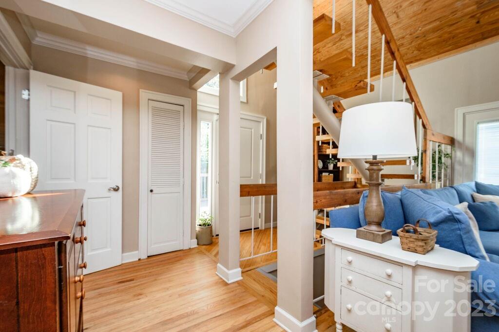 154 Rugby Drive Hendersonville, NC 28791 - Photo 26 of 48 a view of living room filled with furniture and wooden floor