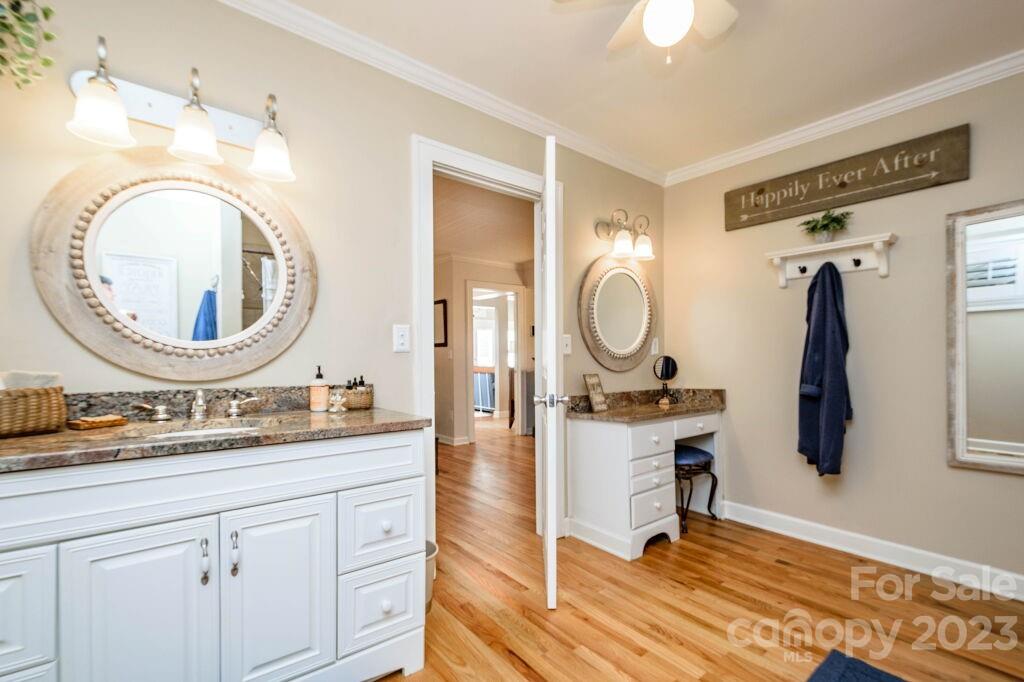 154 Rugby Drive Hendersonville, NC 28791 - Photo 30 of 48 a view of a bathroom with a sink mirror and vanity