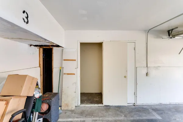 a view of a empty room with storage