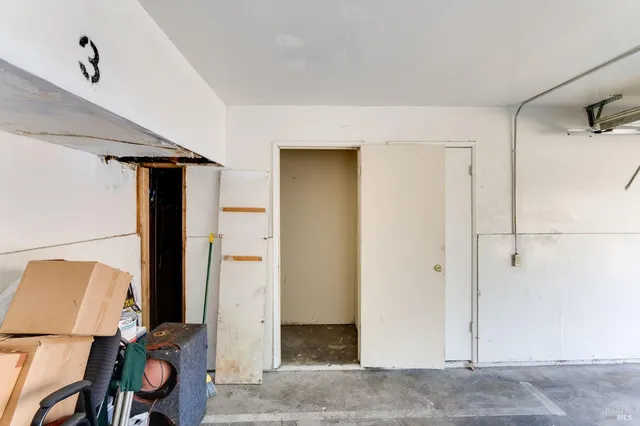 a view of a empty room with storage