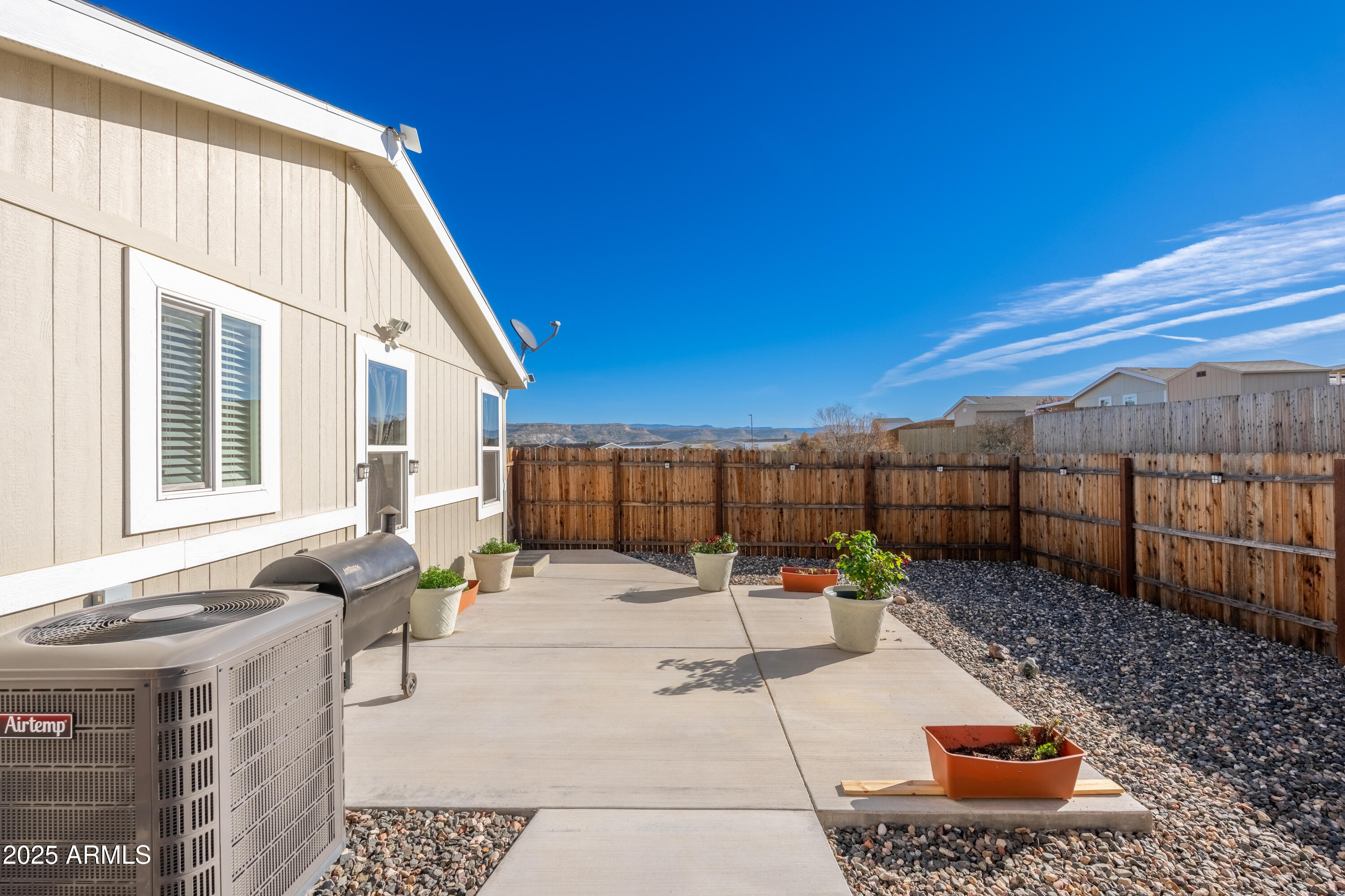 1033 Wheeler Road Camp Verde, AZ 86322 - Photo 32 of 51 a view of a backyard with sitting area