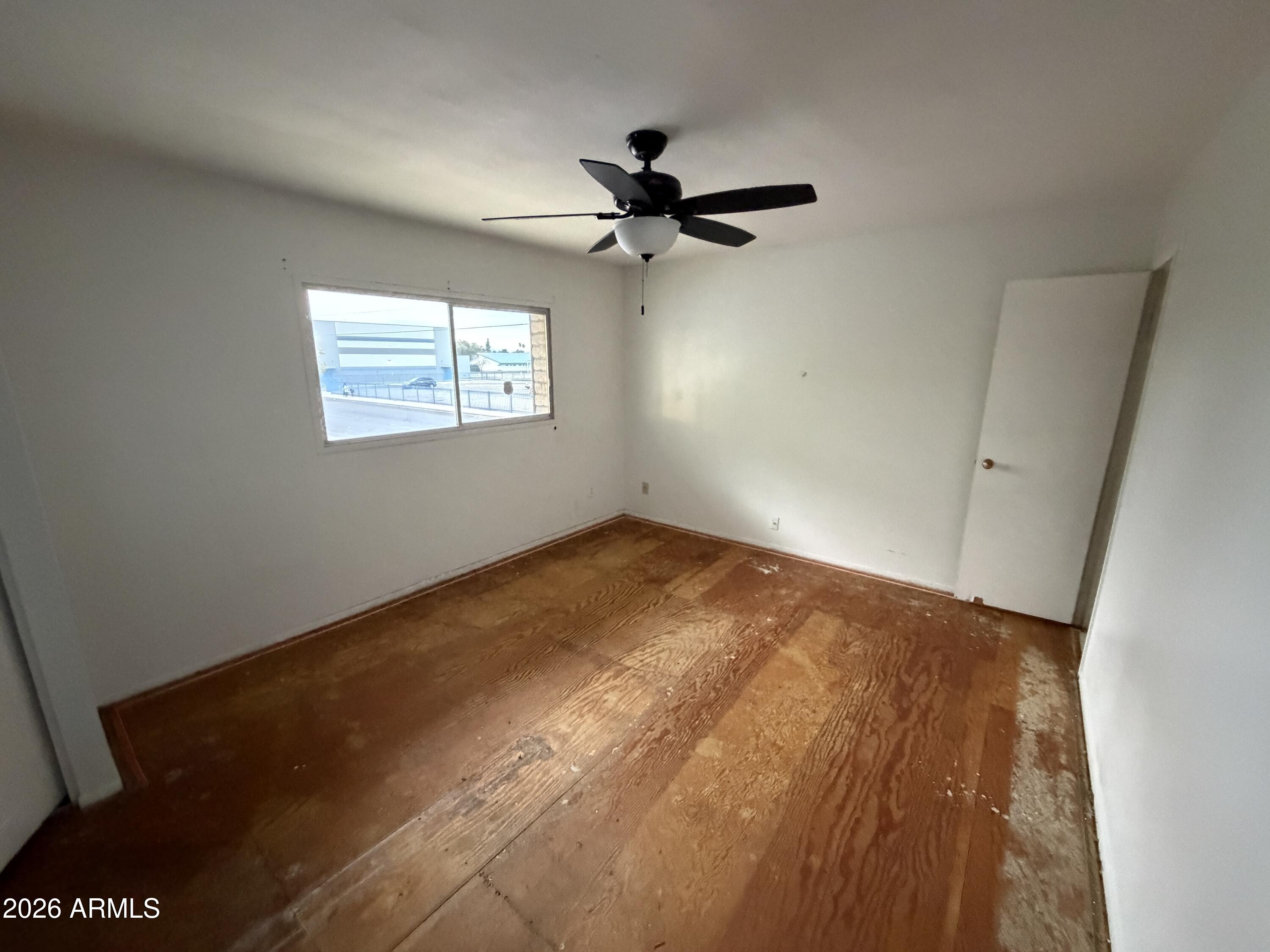 4356 West Ocotillo Road Glendale, AZ 85301 - Photo 7 of 16 an empty room with a window