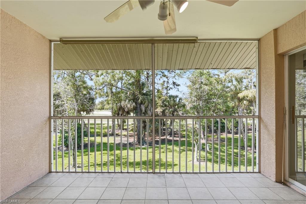 8055 Tiger Cove, Unit 608 Naples, FL 34113 - Photo 7 of 21 a view of a porch with a floor to ceiling window