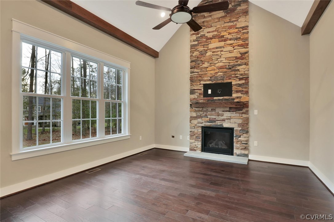 9201 Barrows Ridge Court Chesterfield, VA 23838 - Photo 14 of 35 a view of an empty room with wooden floor fireplace and a window