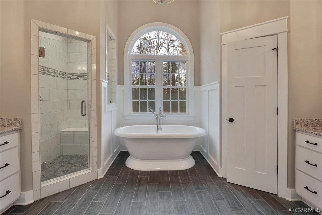 9201 Barrows Ridge Court Chesterfield, VA 23838 - Photo 20 of 35 a spacious bathroom with a bathtub and a shower