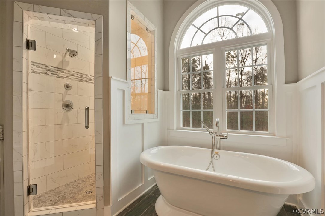 9201 Barrows Ridge Court Chesterfield, VA 23838 - Photo 22 of 35 a white bath tub sitting next to a window
