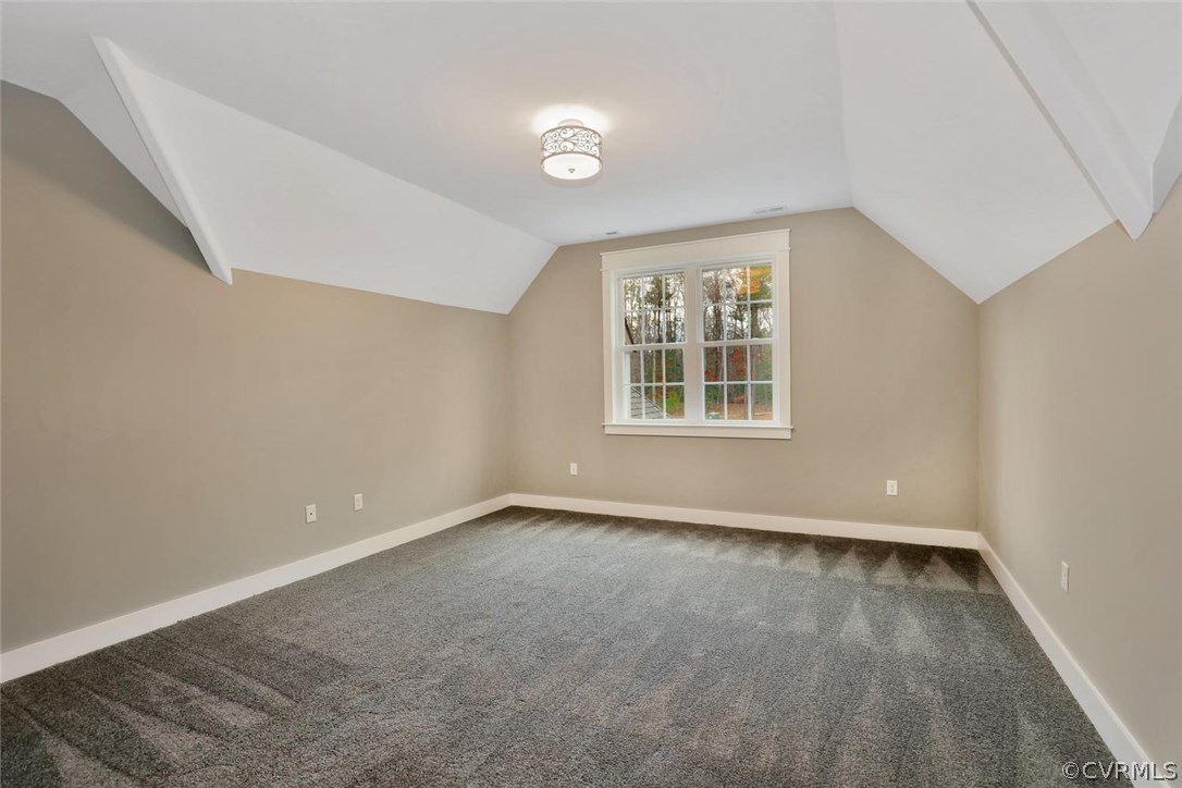9201 Barrows Ridge Court Chesterfield, VA 23838 - Photo 23 of 35 an empty room with wooden floor and windows
