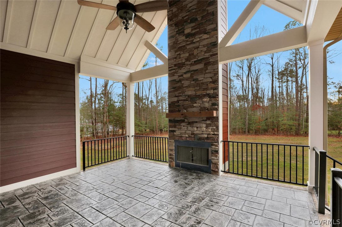 9201 Barrows Ridge Court Chesterfield, VA 23838 - Photo 33 of 35 a view of a porch with a table and chairs