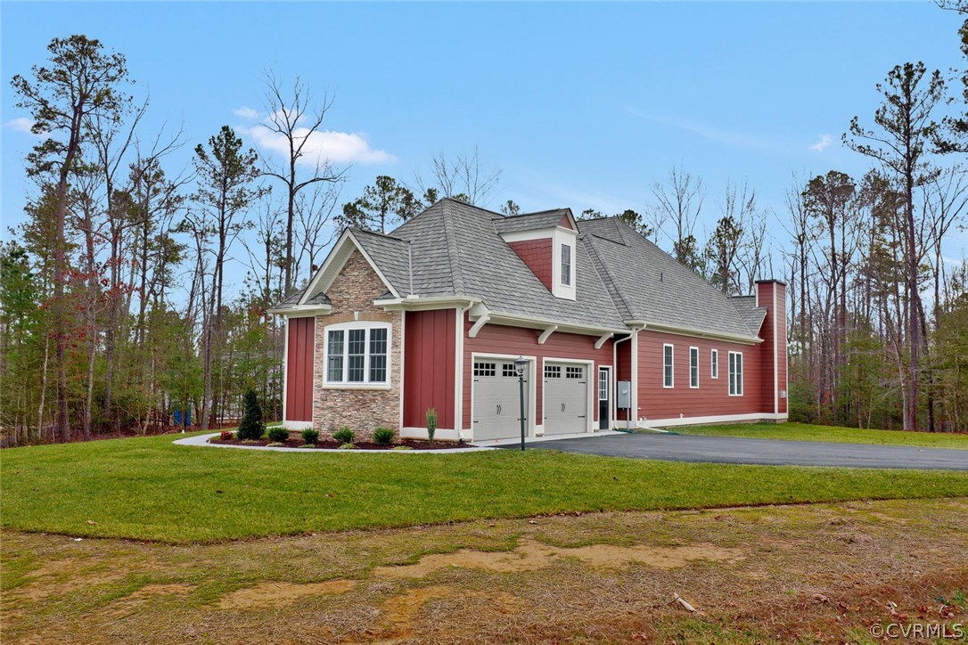9201 Barrows Ridge Court Chesterfield, VA 23838 - Photo 34 of 35 a front view of house with yard and green space