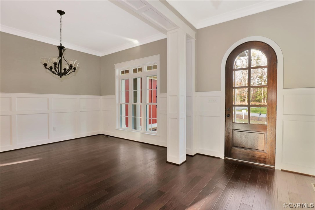 9201 Barrows Ridge Court Chesterfield, VA 23838 - Photo 5 of 35 a view of an empty room with a window and wooden floor