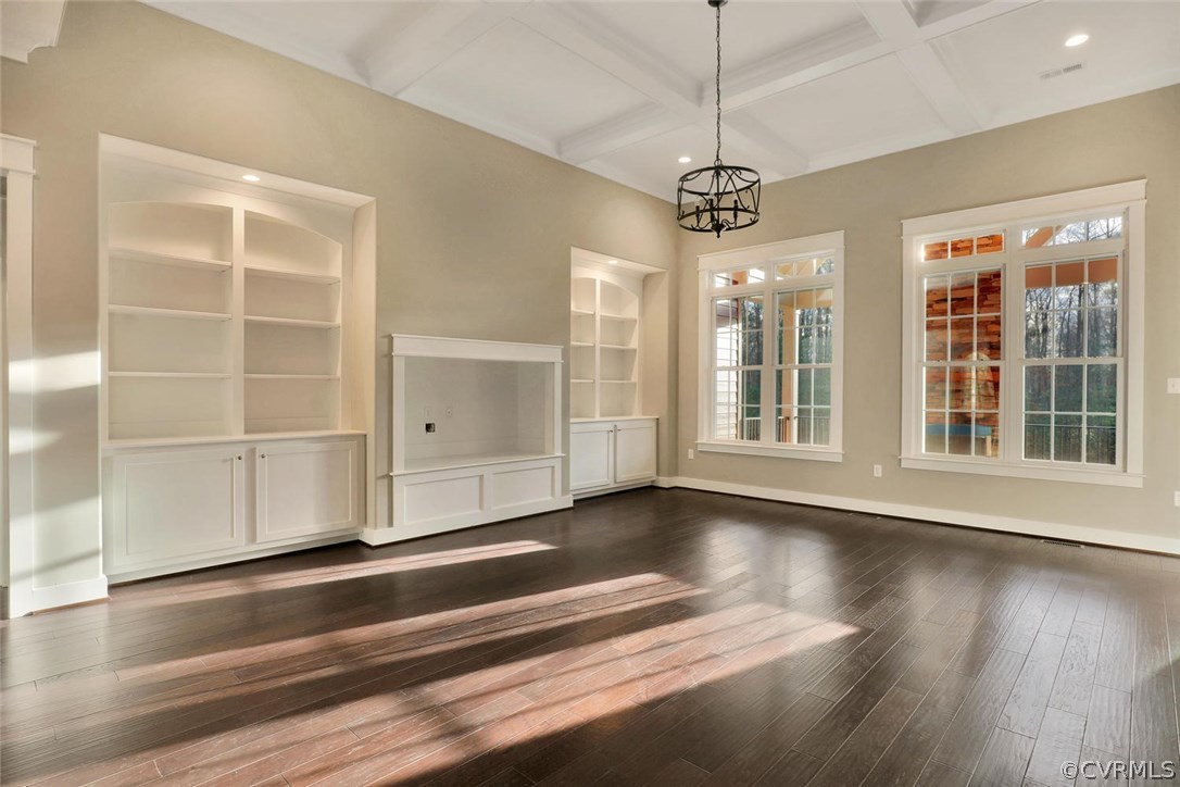 9201 Barrows Ridge Court Chesterfield, VA 23838 - Photo 6 of 35 a view of an empty room with wooden floor and windows