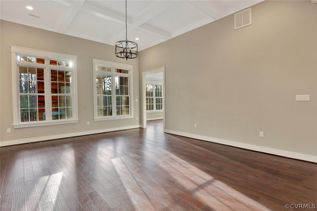 9201 Barrows Ridge Court Chesterfield, VA 23838 - Photo 8 of 35 a view of an empty room with wooden floor and a window