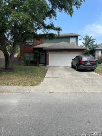 a car parked in front of house