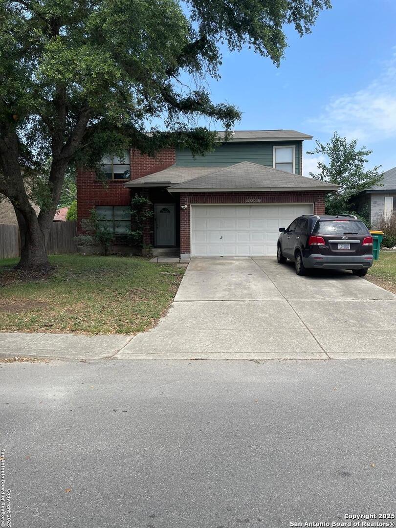 a car parked in front of house