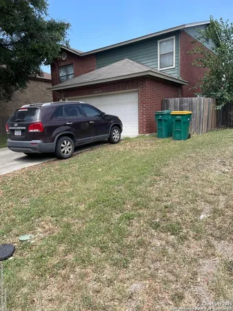 a car parked in front of a house