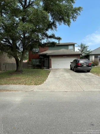 a car parked in front of a house
