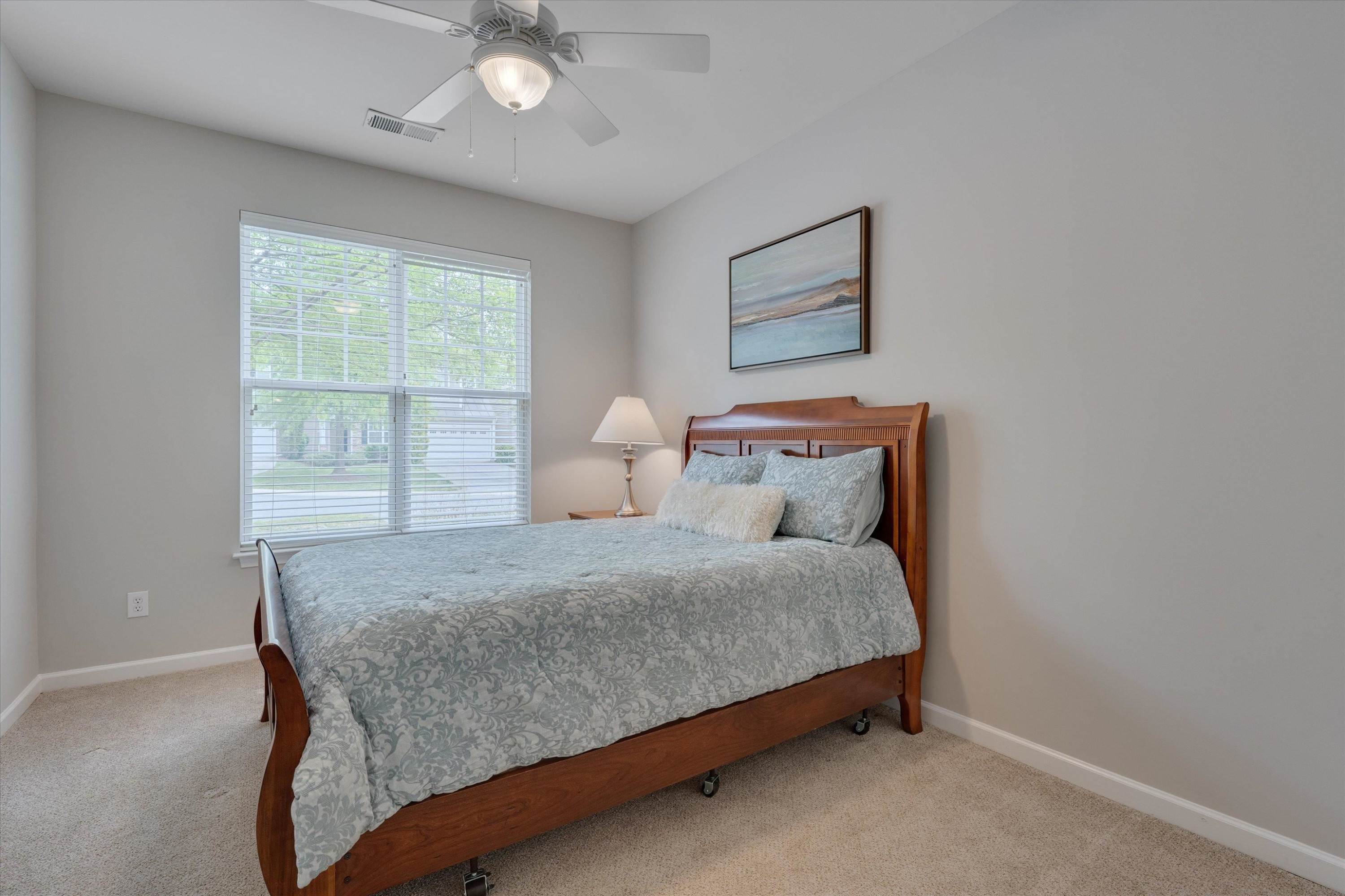 5 Gardenview Place Durham, NC 27713 - Photo 14 of 32 a bedroom with a bed and window