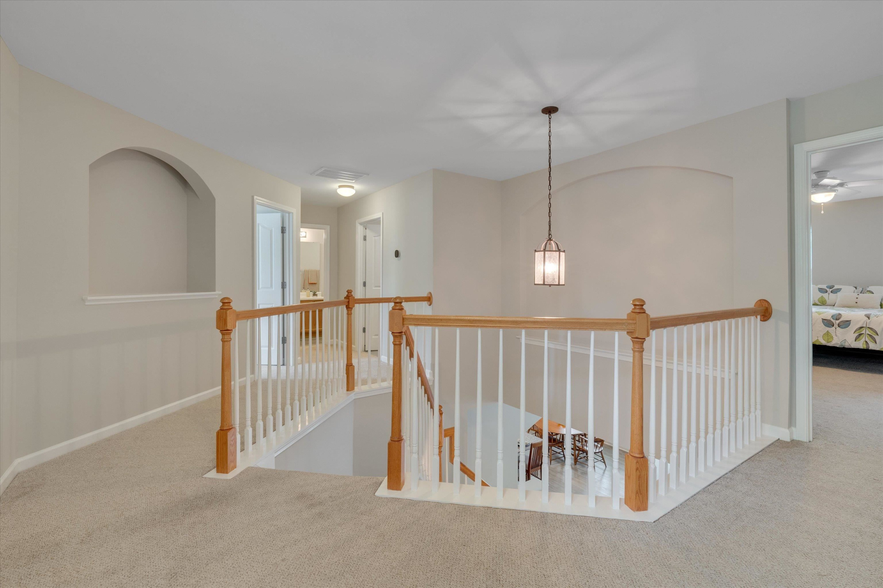 5 Gardenview Place Durham, NC 27713 - Photo 18 of 32 a view of a hallway with stairs
