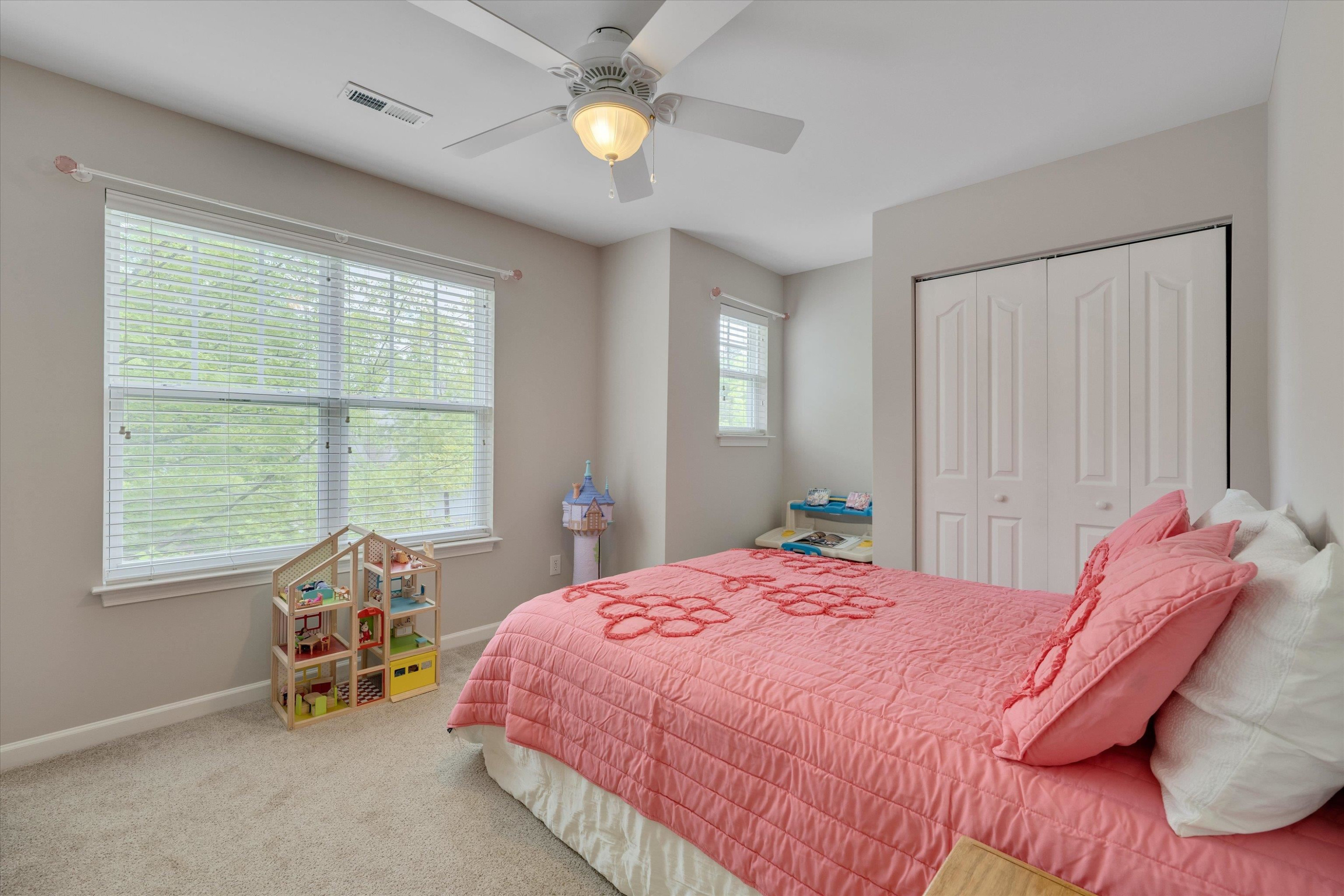 5 Gardenview Place Durham, NC 27713 - Photo 23 of 32 a bedroom with a bed and a window