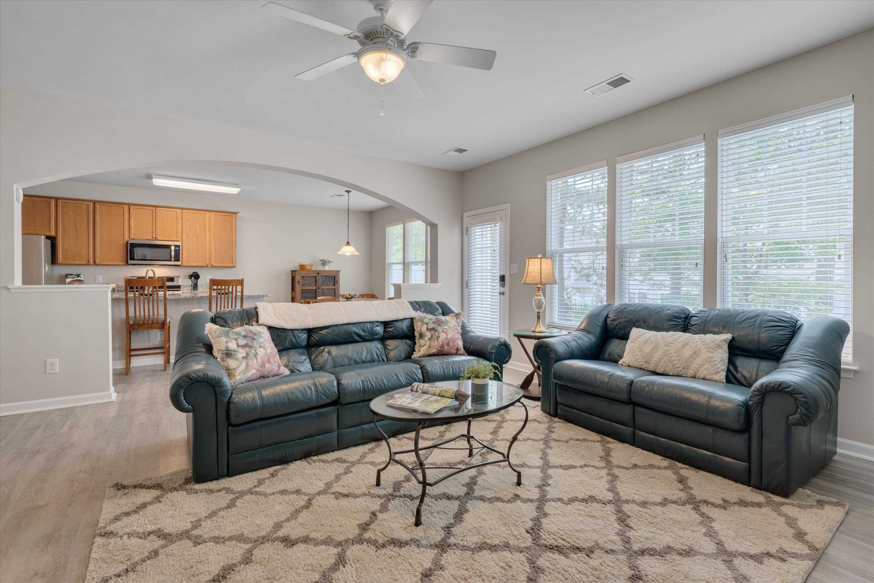 5 Gardenview Place Durham, NC 27713 - Photo 6 of 32 a living room with furniture and a large window