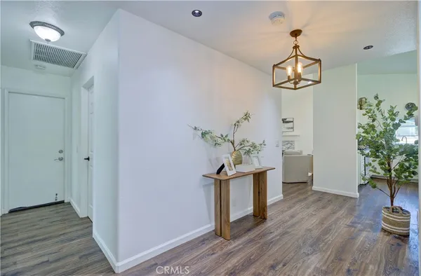 a view of dining room and wooden floor