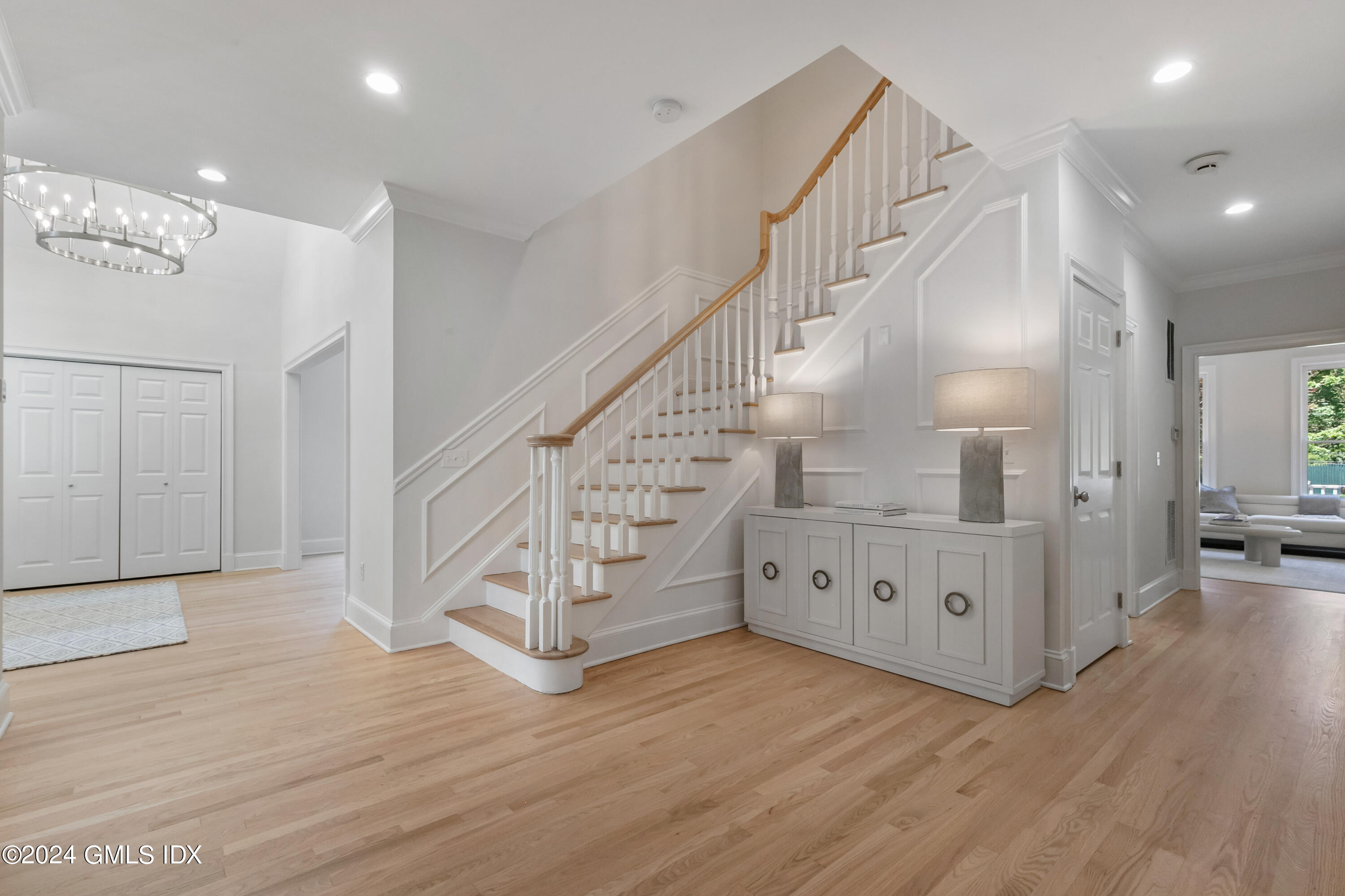 107 Summit Road Riverside, CT 06878 - Photo 11 of 47 a view of entryway and hall with wooden floor