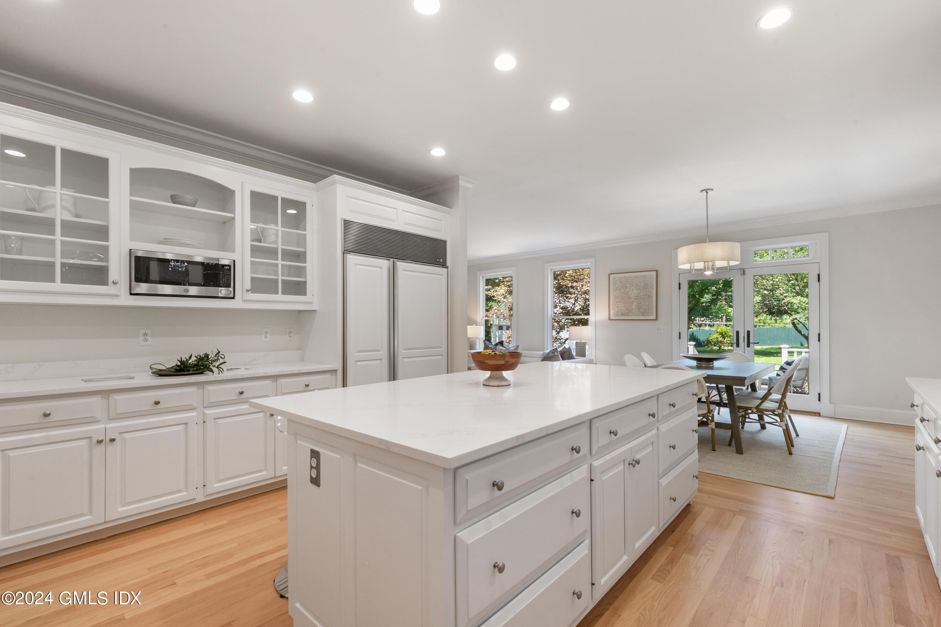 107 Summit Road Riverside, CT 06878 - Photo 19 of 47 a kitchen with sink attached with living room