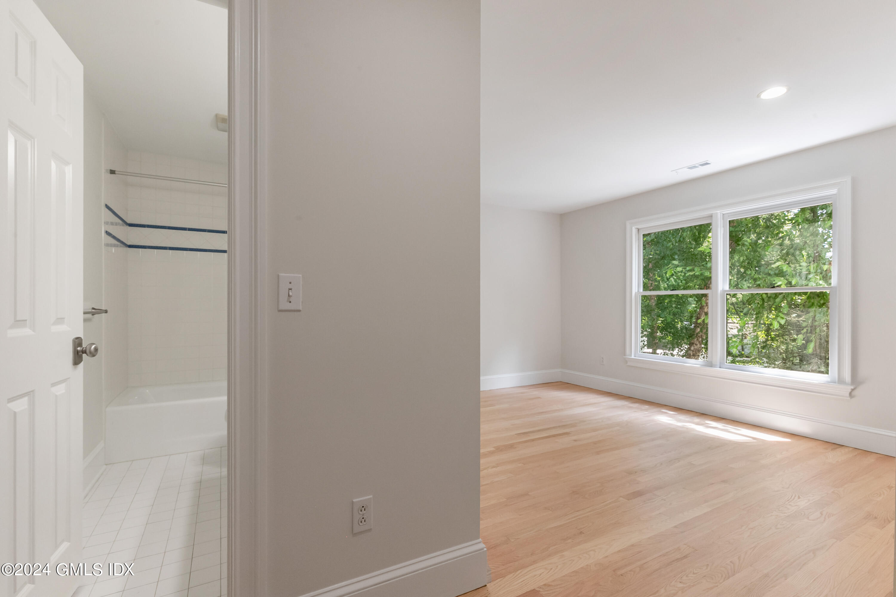 107 Summit Road Riverside, CT 06878 - Photo 27 of 47 a view of an empty room with a window