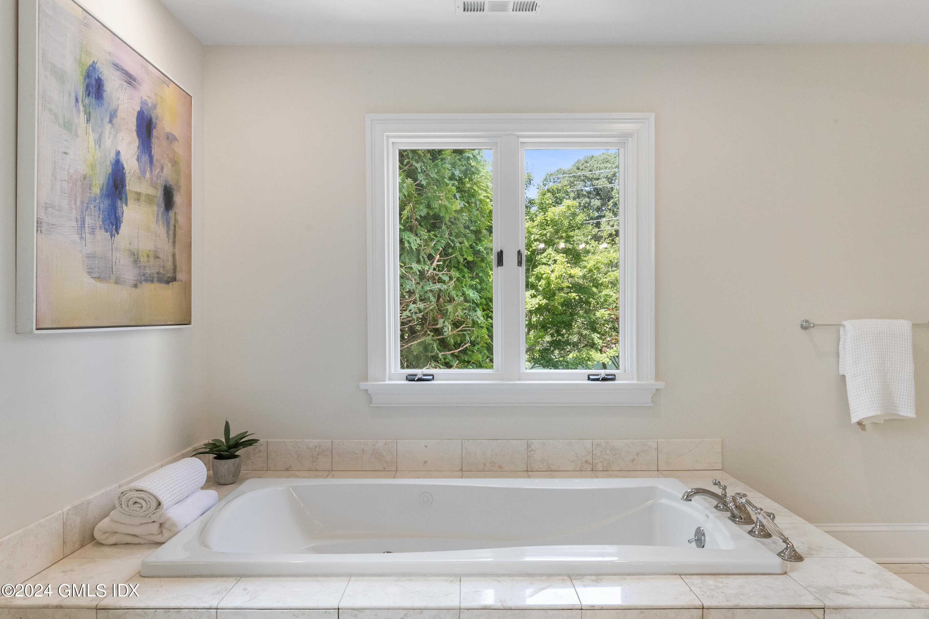 107 Summit Road Riverside, CT 06878 - Photo 33 of 47 a white bath tub sitting next to a window