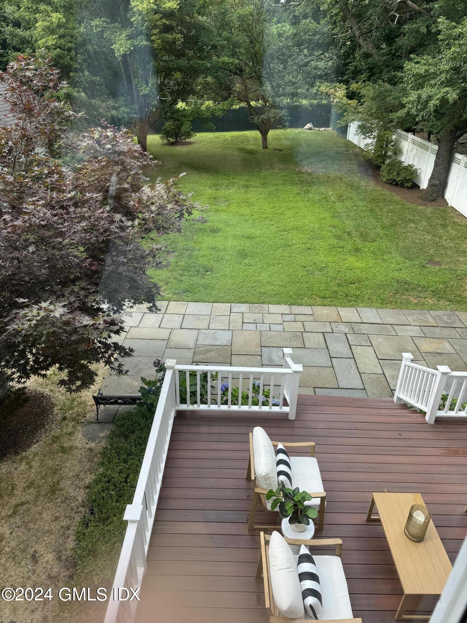 107 Summit Road Riverside, CT 06878 - Photo 38 of 47 a view of a back yard of the house