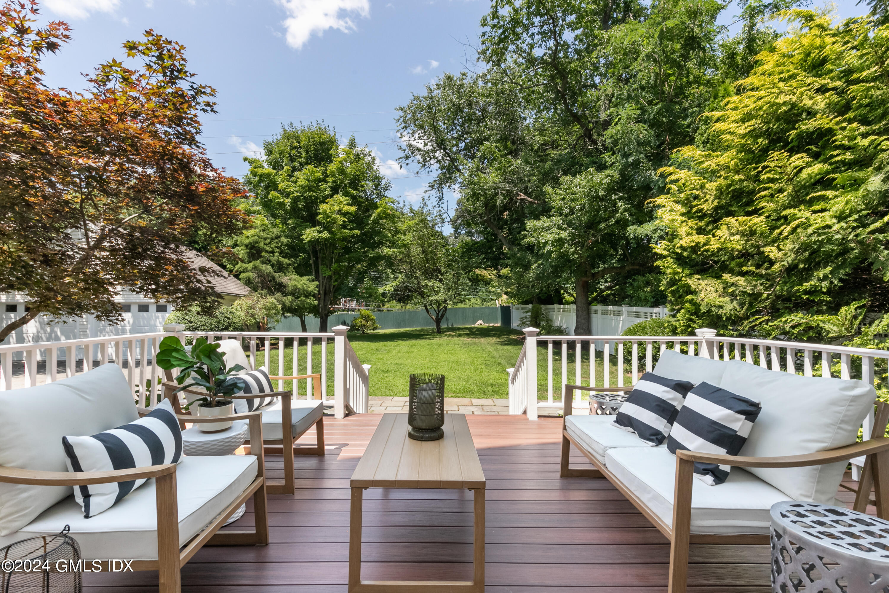 107 Summit Road Riverside, CT 06878 - Photo 39 of 47 a view of a balcony with wooden floor and outdoor seating