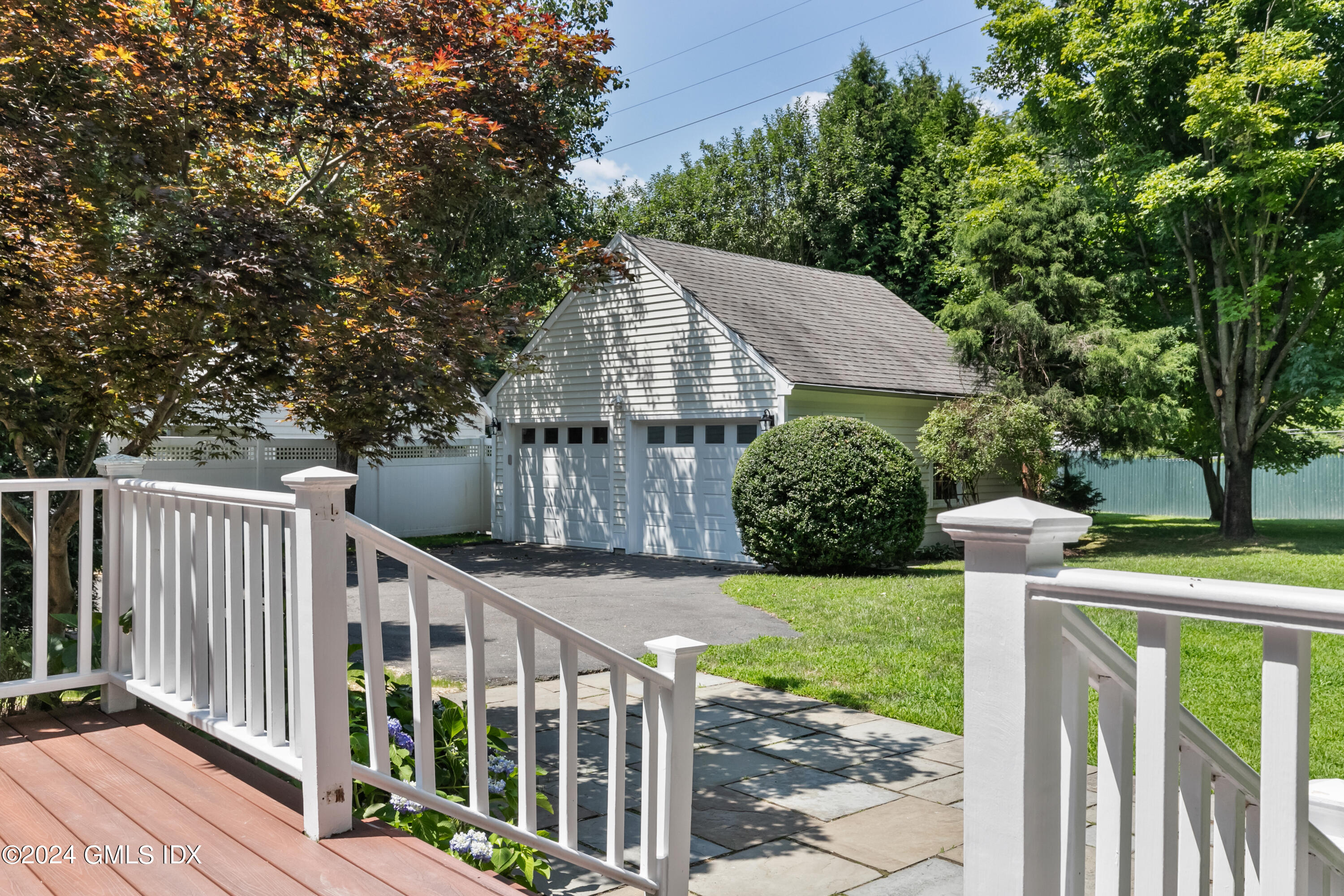 107 Summit Road Riverside, CT 06878 - Photo 42 of 47 a view of a house with backyard and deck