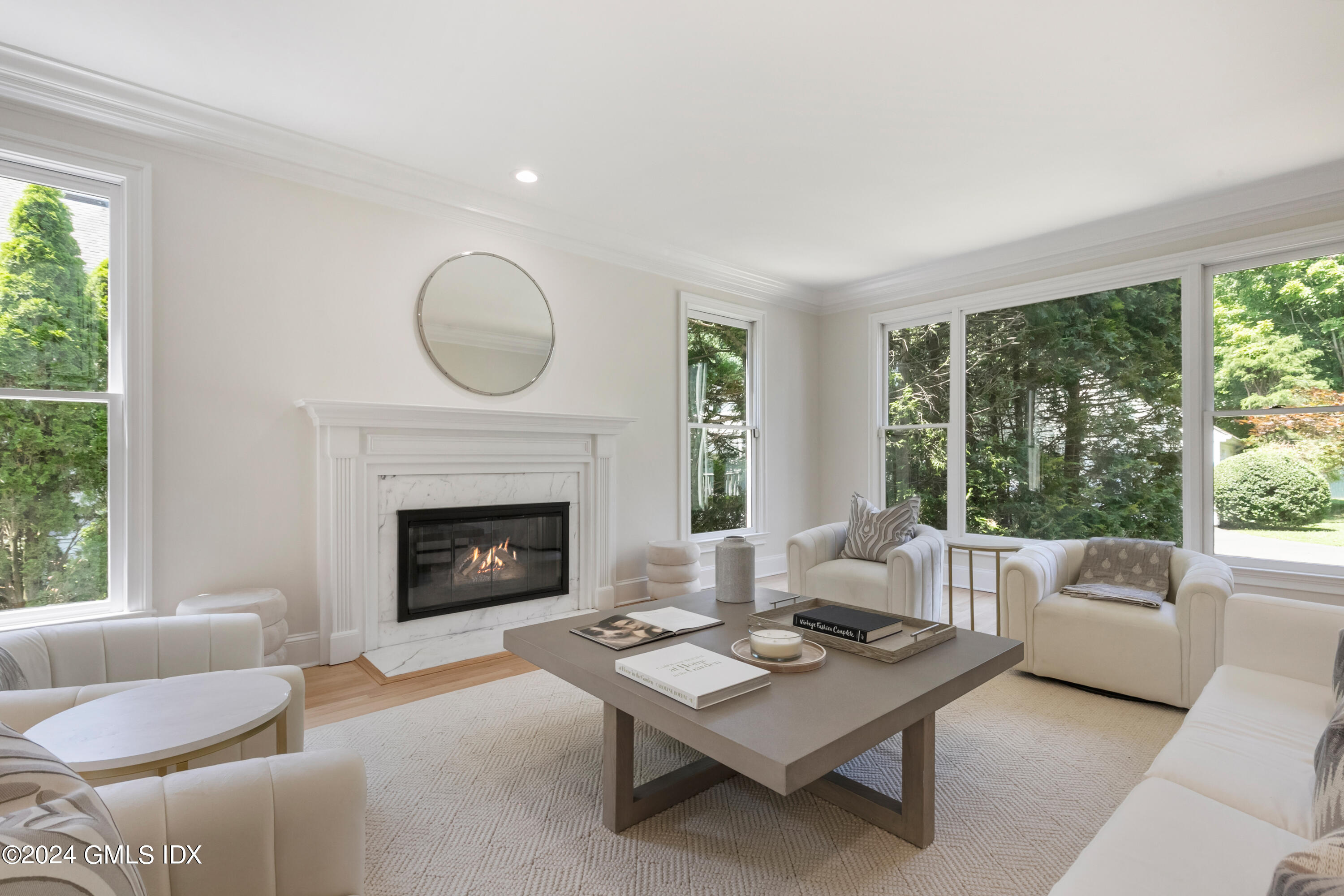 107 Summit Road Riverside, CT 06878 - Photo 8 of 47 a living room with furniture and a fireplace