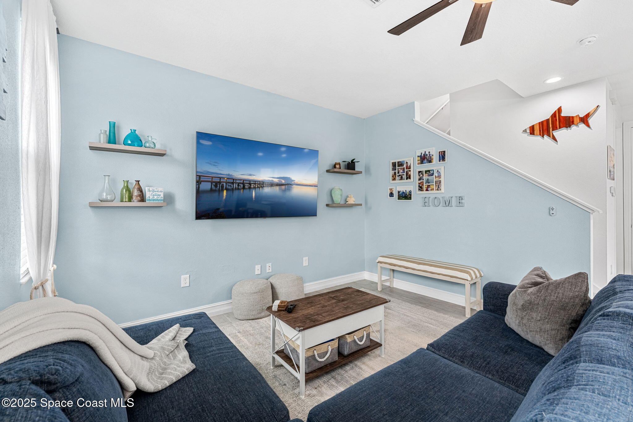 1810 Noel Place, Unit 107 Melbourne, FL 32935 - Photo 12 of 59 a living room with furniture and a couch