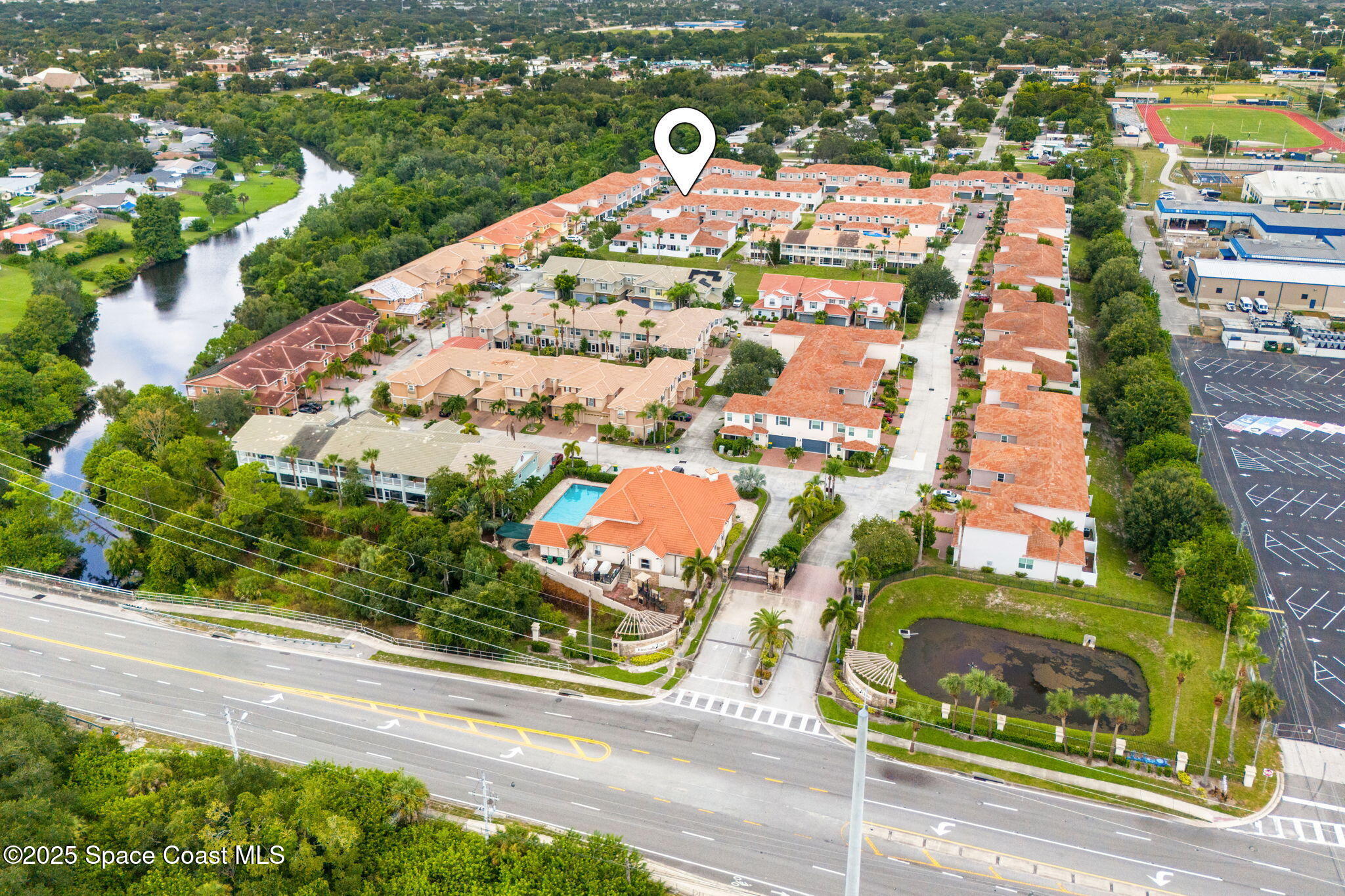 1810 Noel Place, Unit 107 Melbourne, FL 32935 - Photo 2 of 59 a view of a city