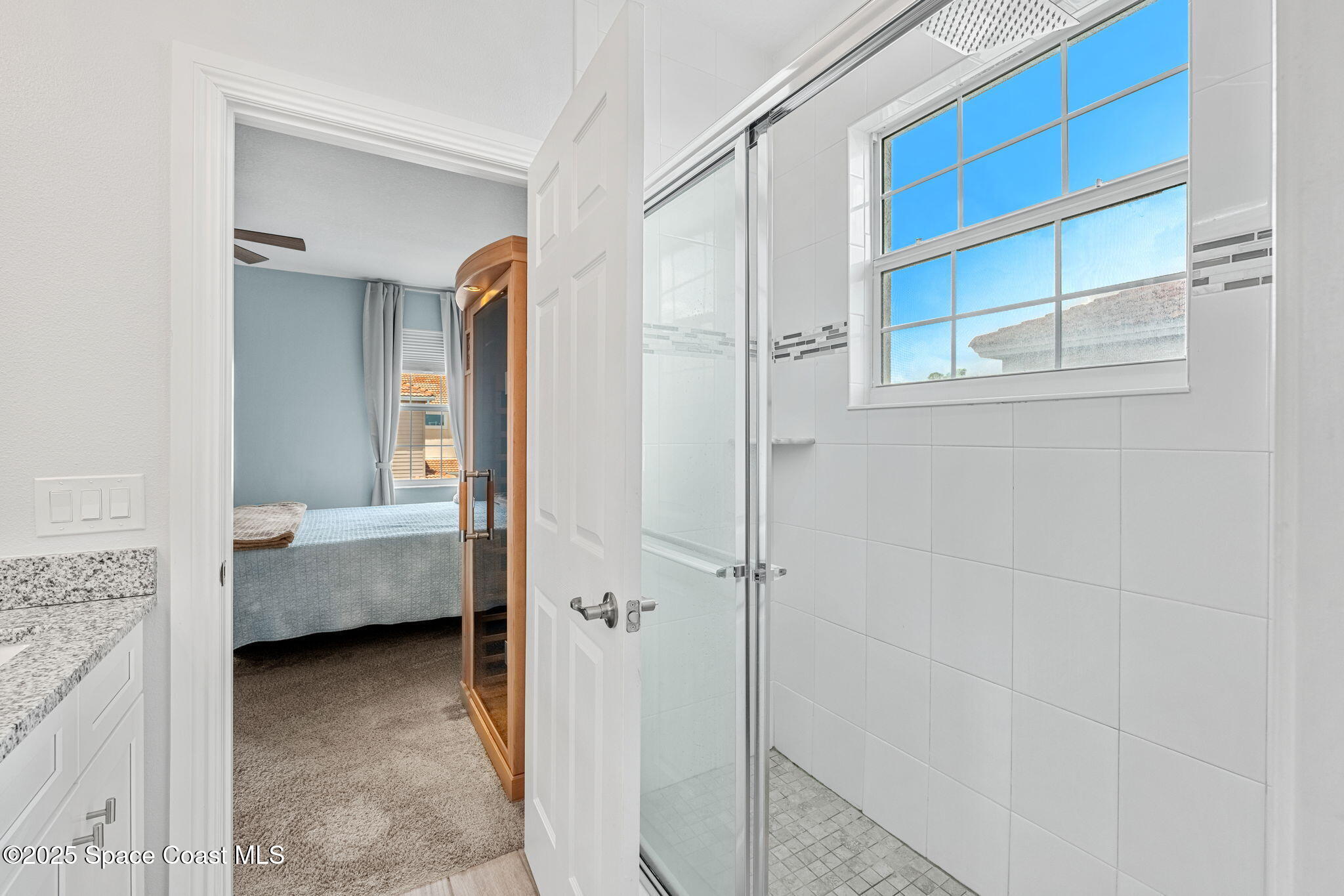 1810 Noel Place, Unit 107 Melbourne, FL 32935 - Photo 30 of 59 a en suite bathroom with a tub shower and a sink