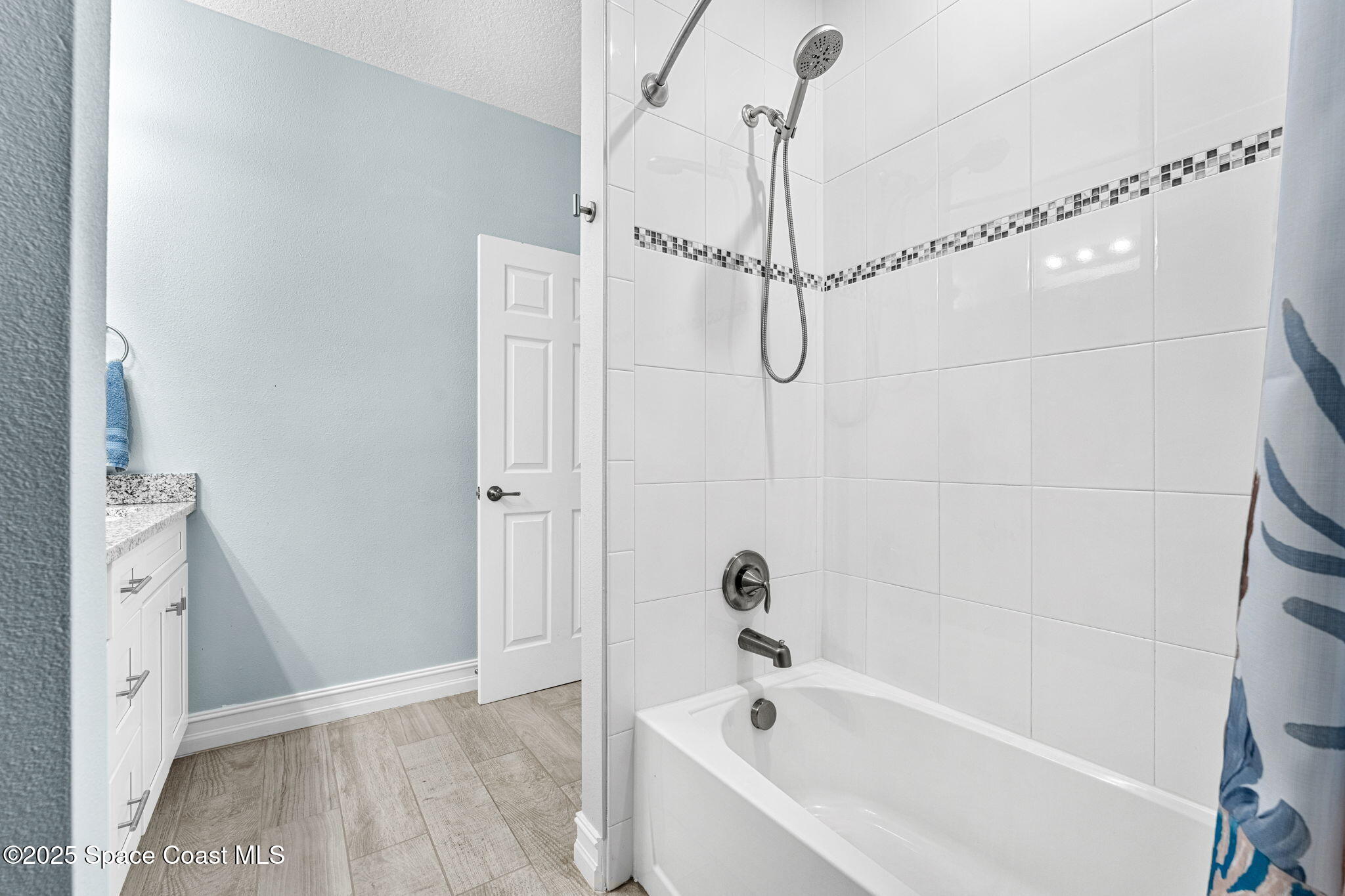 1810 Noel Place, Unit 107 Melbourne, FL 32935 - Photo 38 of 59 a white bath tub sitting next to a shower
