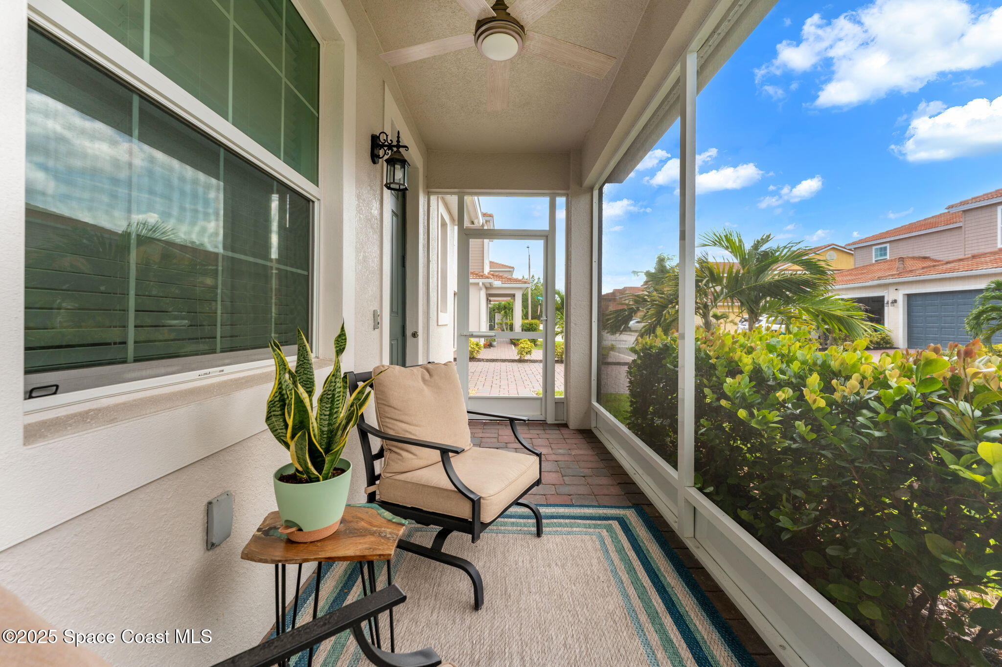 1810 Noel Place, Unit 107 Melbourne, FL 32935 - Photo 42 of 59 a house view with a seating space and garden view