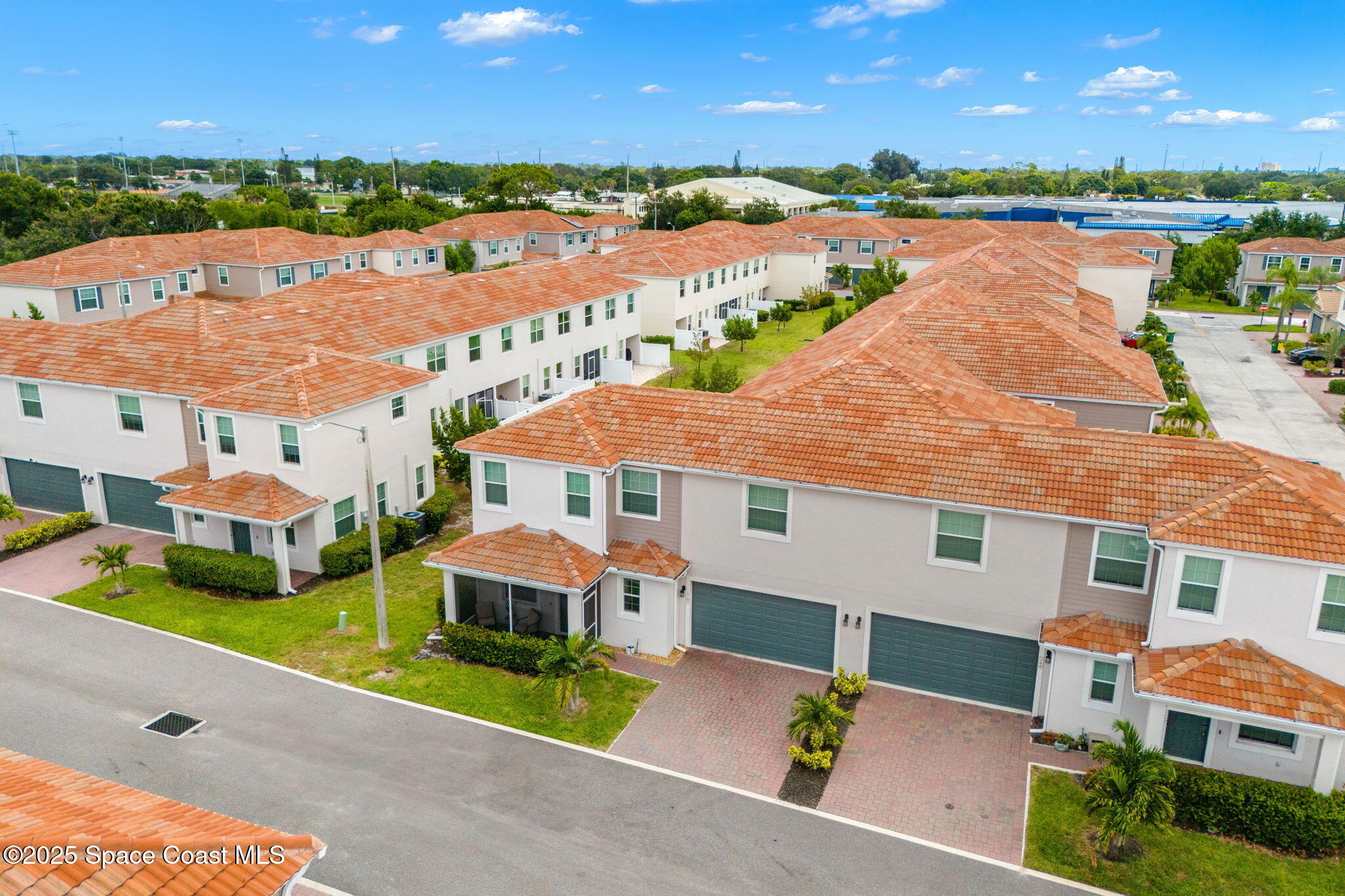 1810 Noel Place, Unit 107 Melbourne, FL 32935 - Photo 43 of 59 aerial view of a house with outdoor space and lake view in back