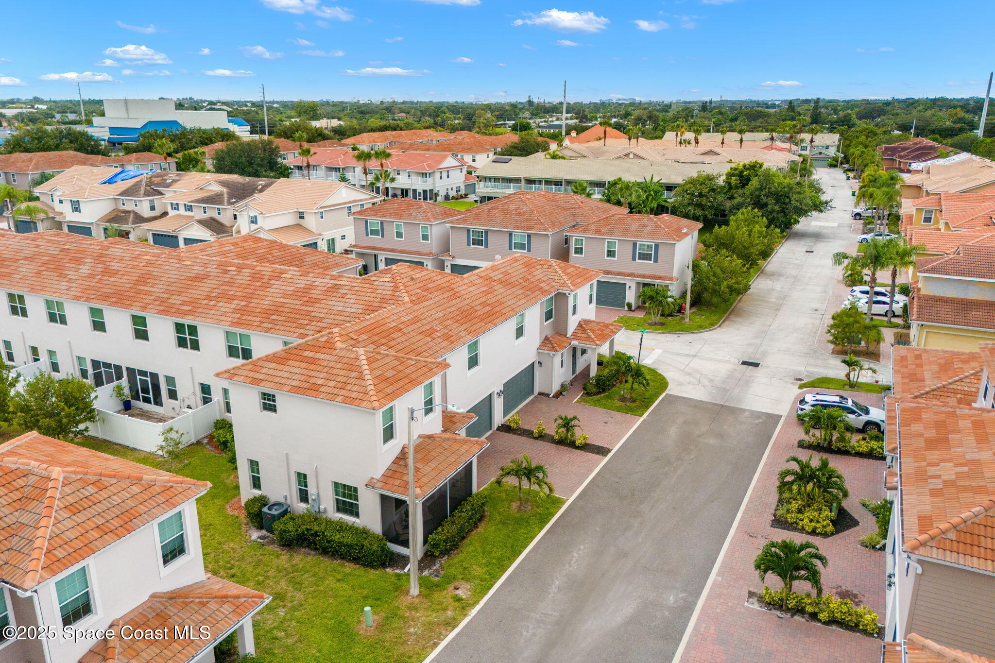 1810 Noel Place, Unit 107 Melbourne, FL 32935 - Photo 44 of 59 a view of a city with lawn chairs