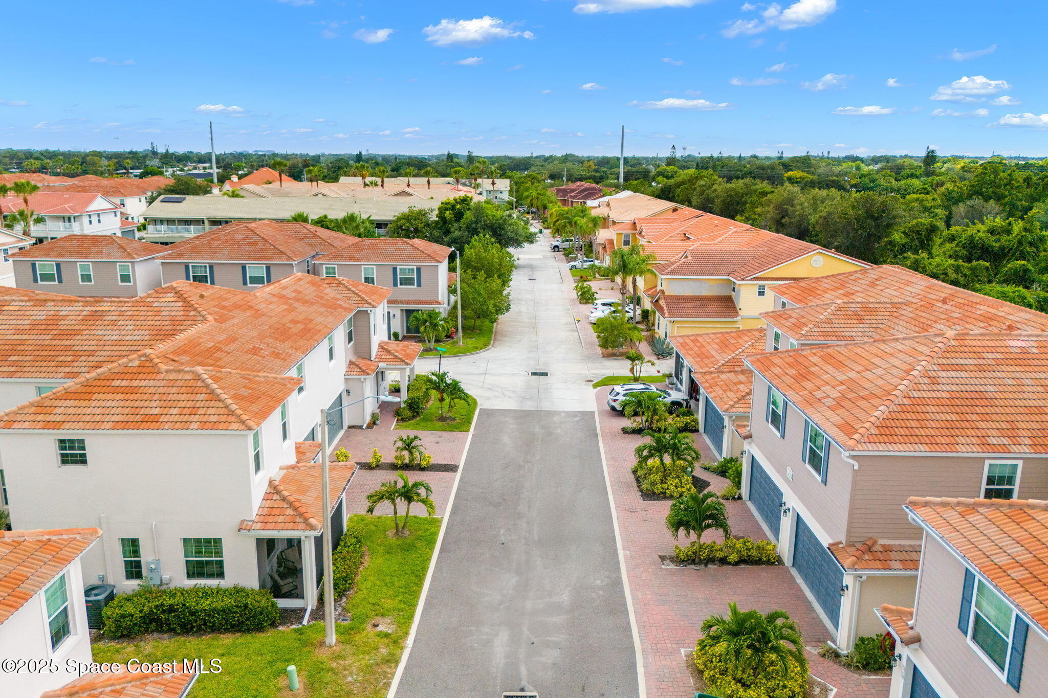 1810 Noel Place, Unit 107 Melbourne, FL 32935 - Photo 50 of 59 a view of a city with lawn chairs