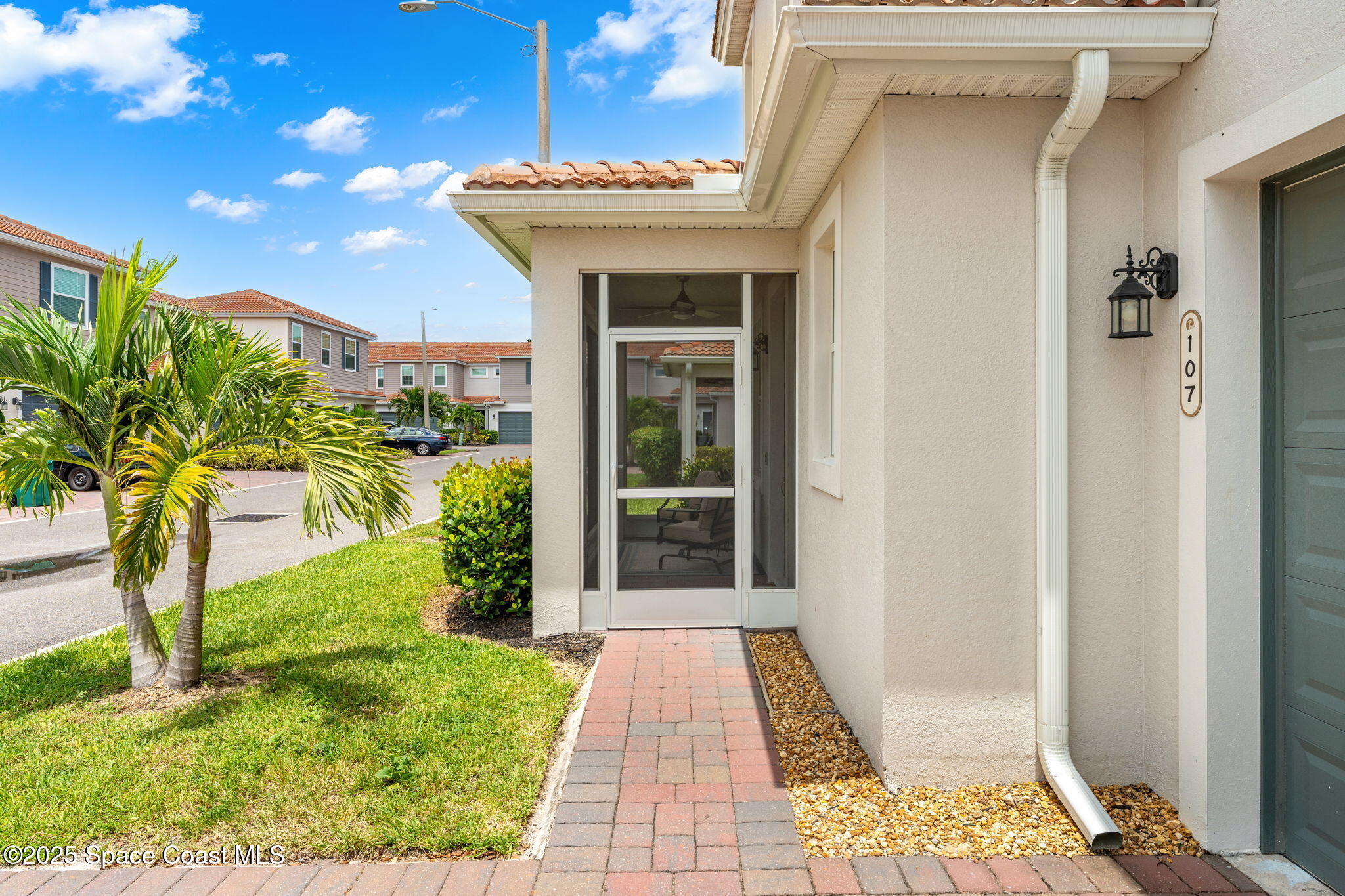 1810 Noel Place, Unit 107 Melbourne, FL 32935 - Photo 5 of 59 a view of a house with a porch