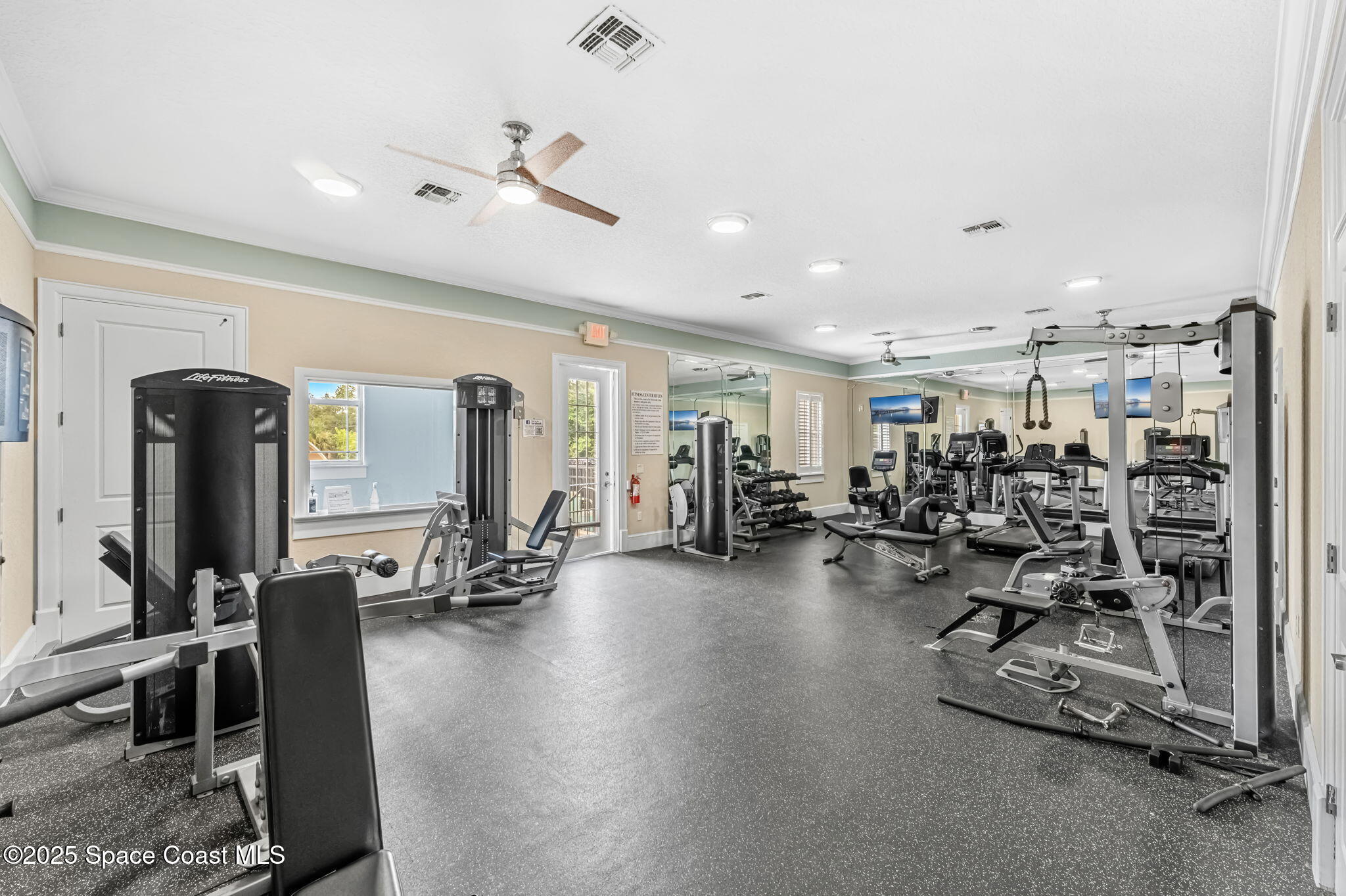 1810 Noel Place, Unit 107 Melbourne, FL 32935 - Photo 56 of 59 a view of a room with gym equipment