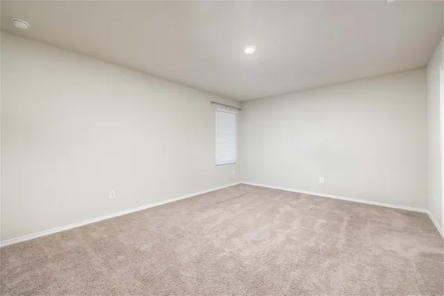 an empty room with a natural light