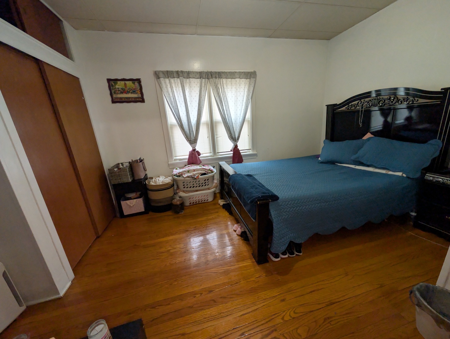920 Augusta Avenue Elgin, IL 60120 - Photo 11 of 16 a bedroom with a bed and a window