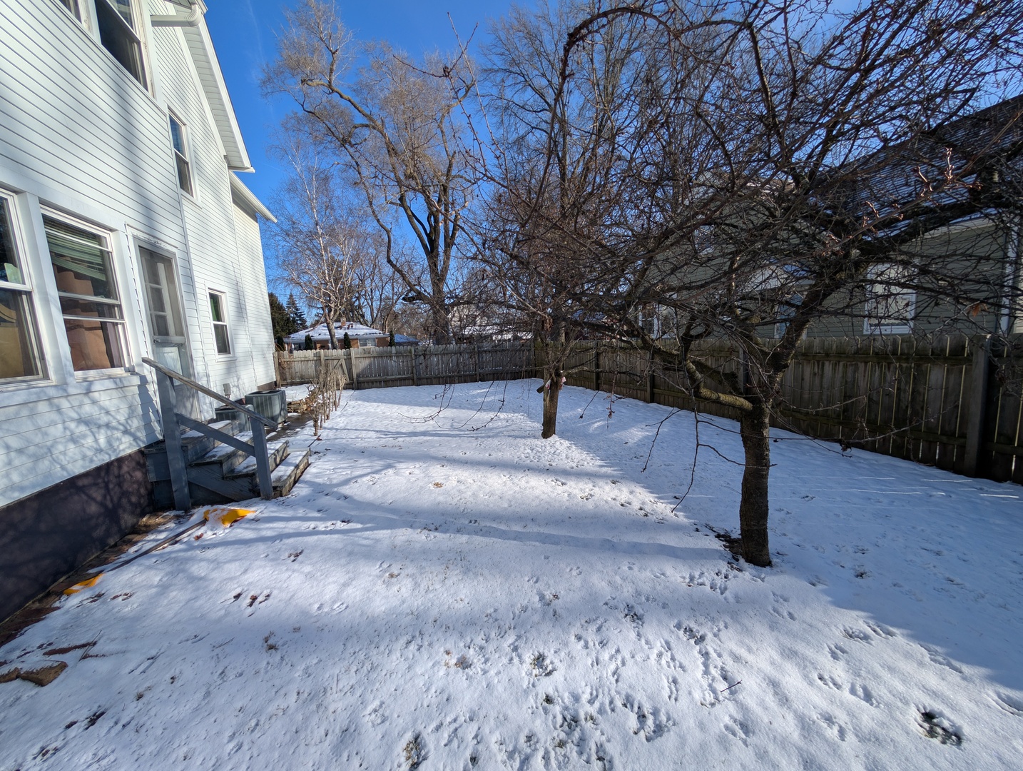 920 Augusta Avenue Elgin, IL 60120 - Photo 2 of 16 a view of a yard with trees