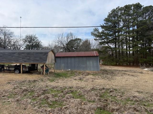 1525 Mansfield Road Reno, TX 75462 - Photo 23 of 34 a view of a backyard